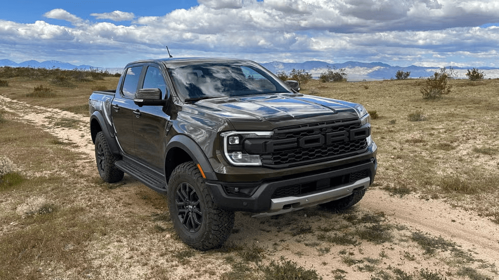 Close-up view of 2025 Ford Ranger Raptor front grille and LED headlights